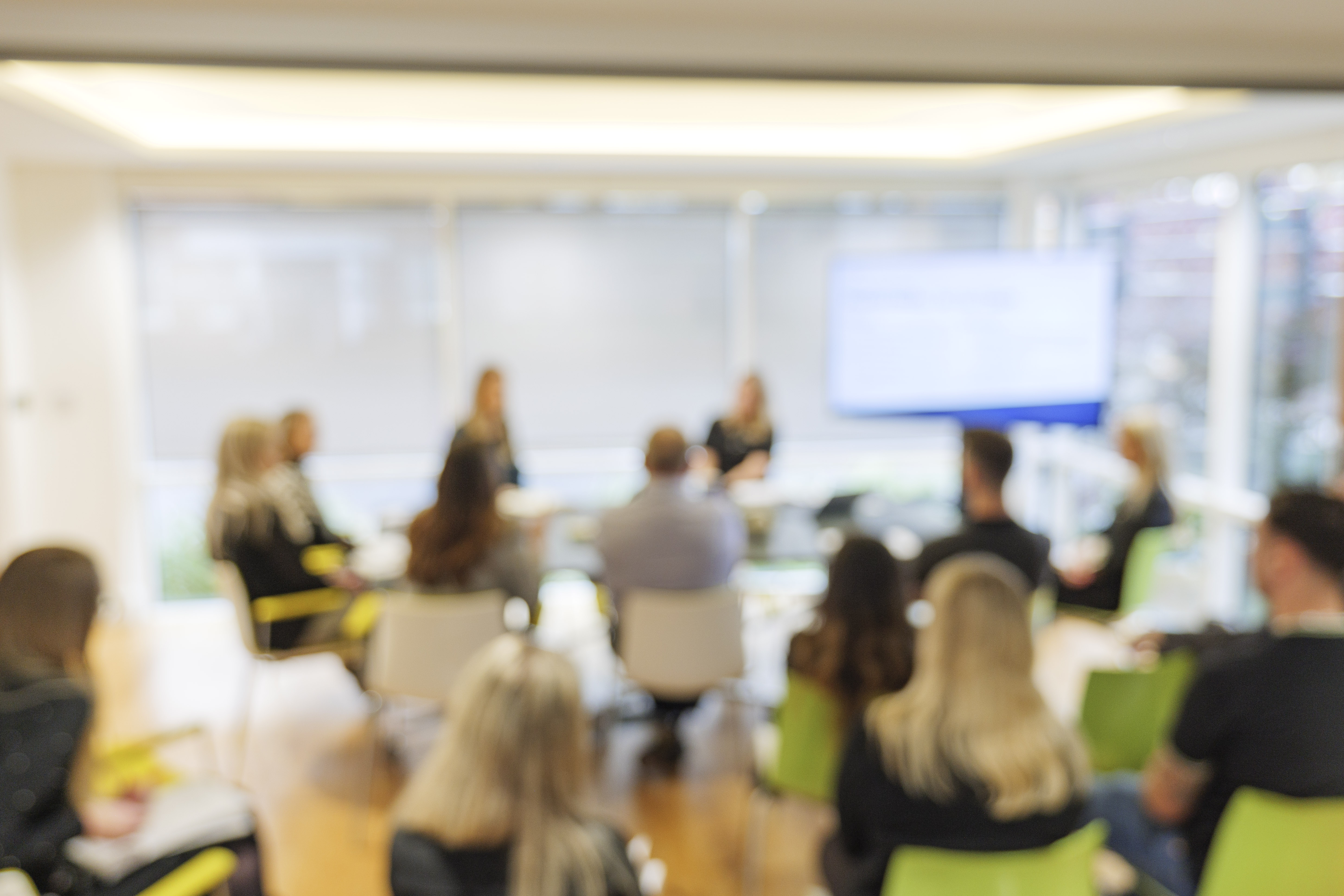 Headley media colleagues in a meeting