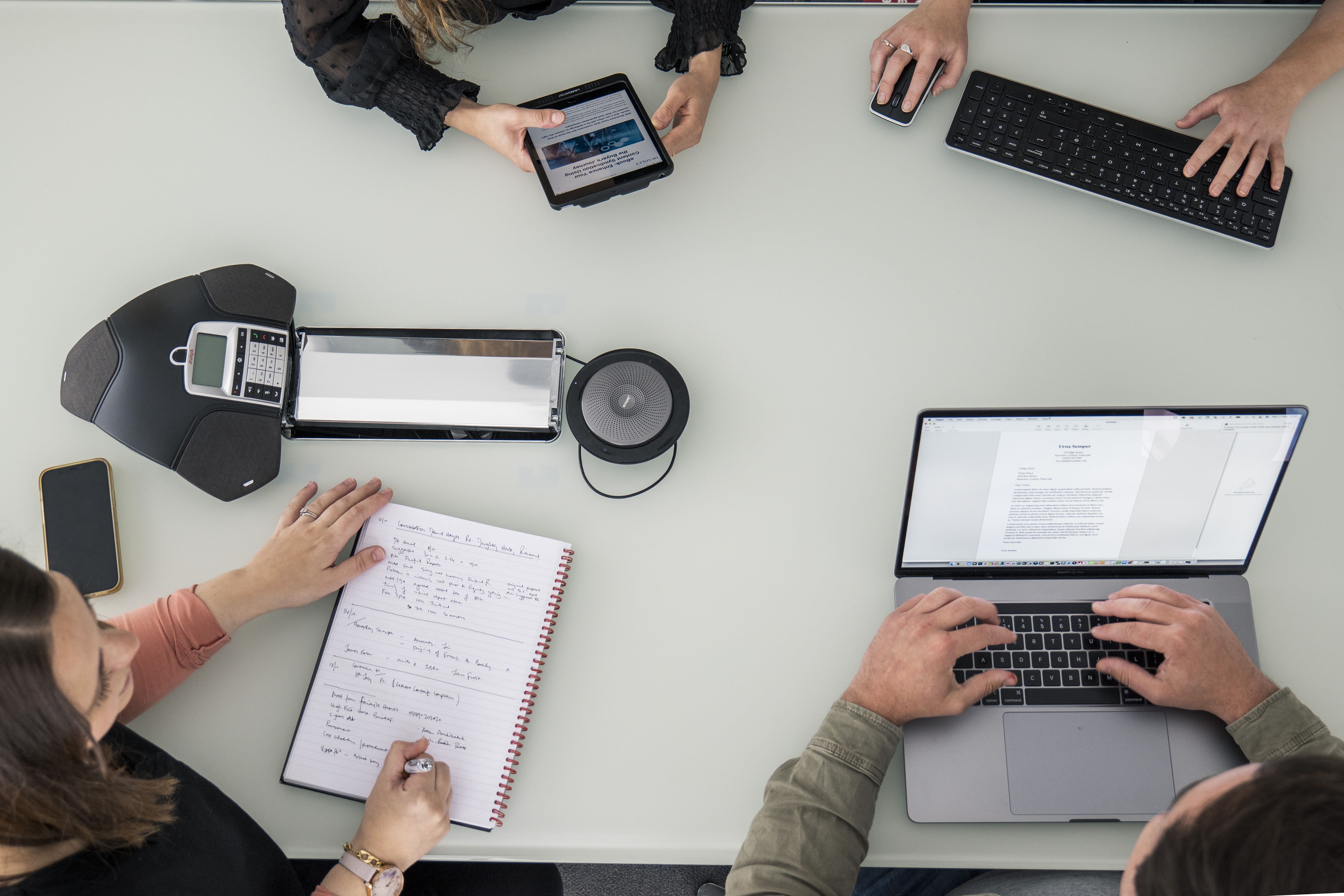 People on technology in a meeting