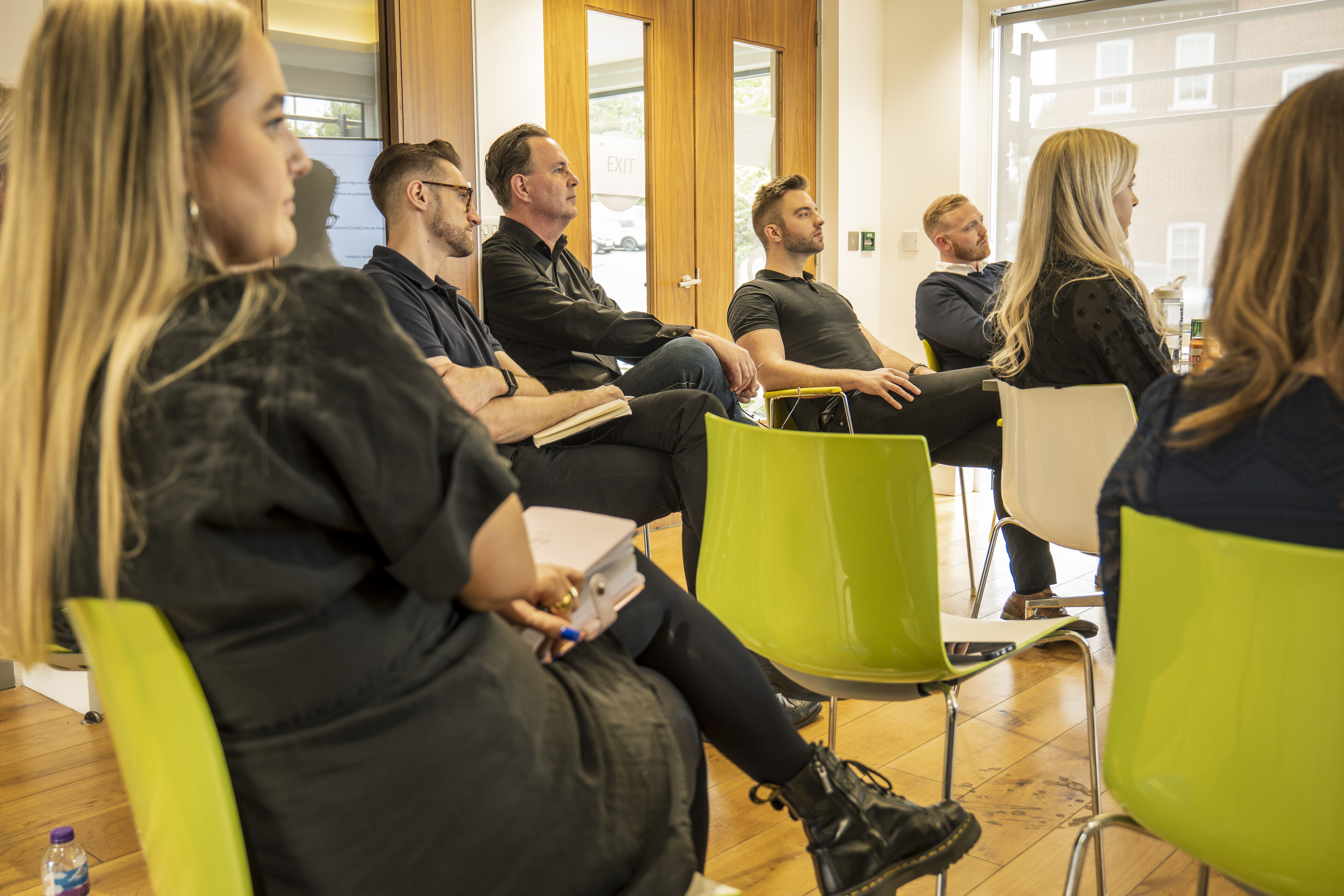 Headley Media colleagues watching a presentation