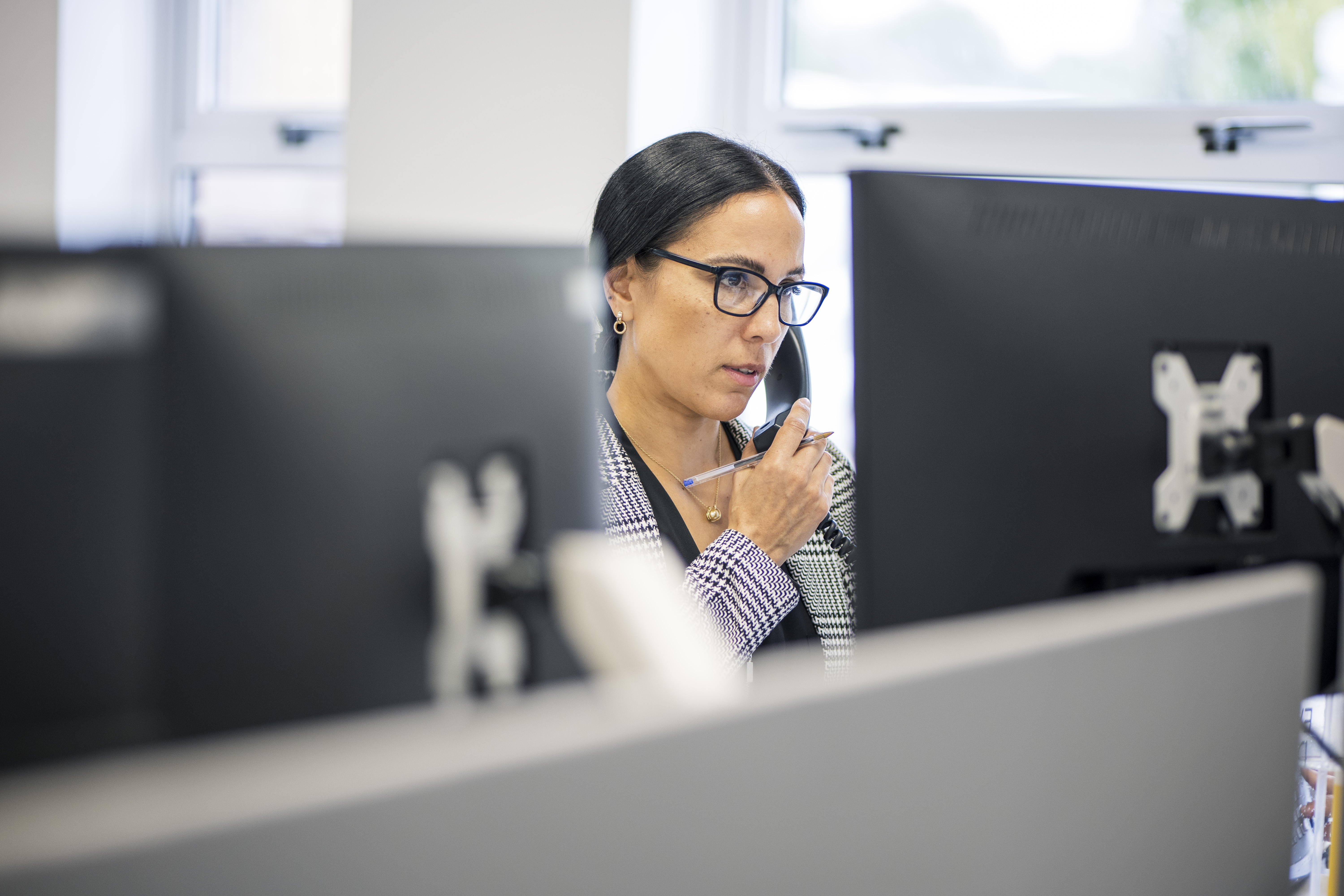 Headley Media colleague on the phone