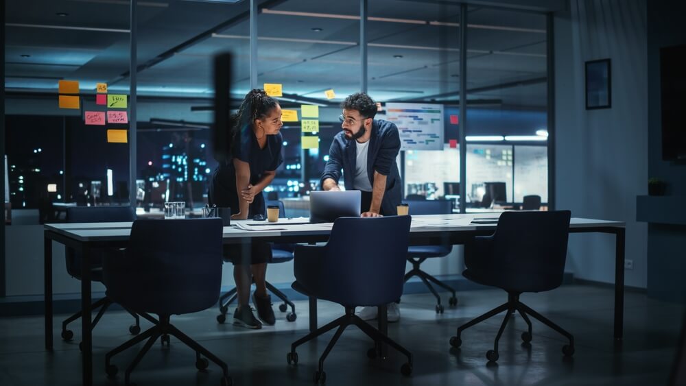 Two people in meeting in a modern office
