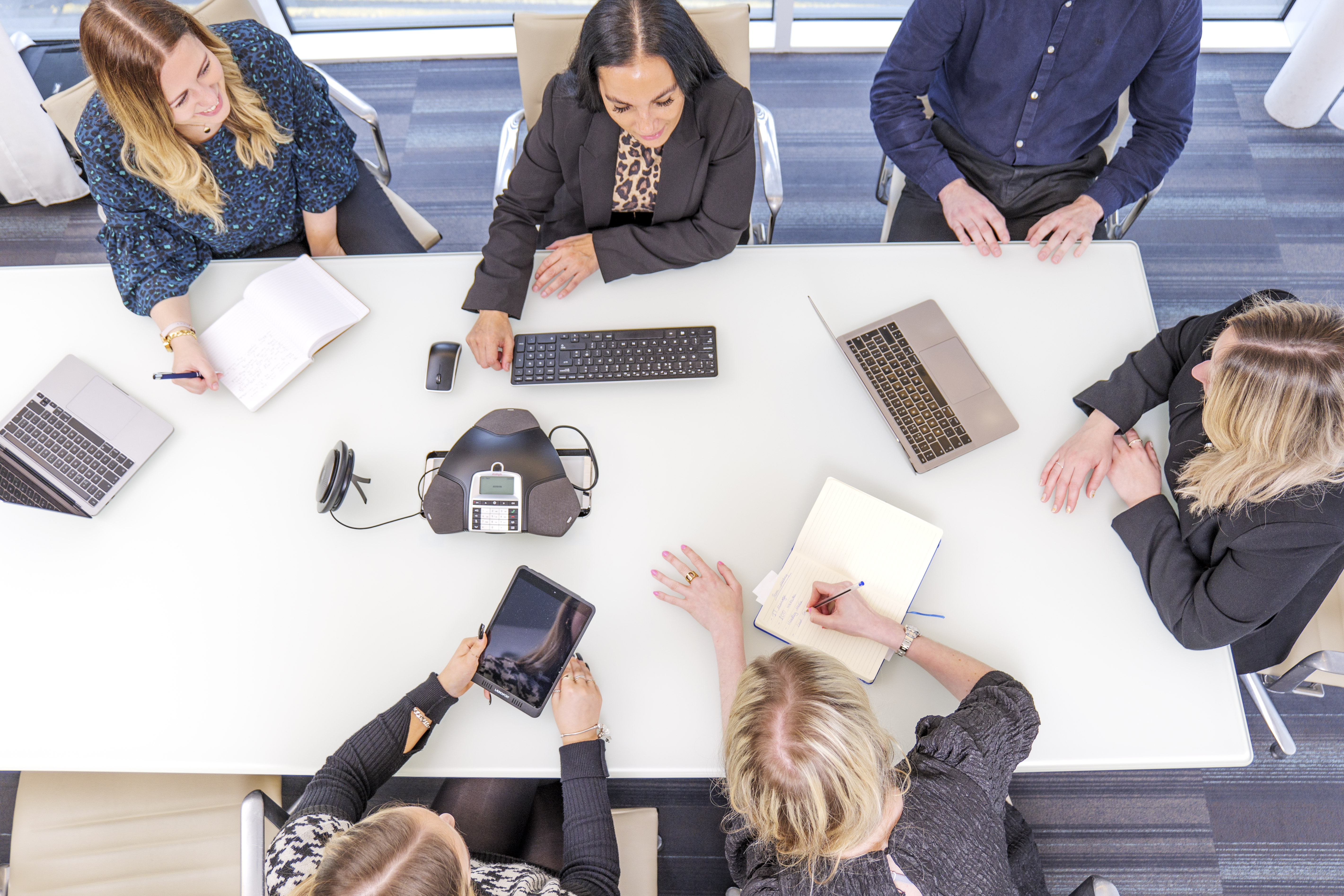 Headley Media colleagues collaborating in a meeting
