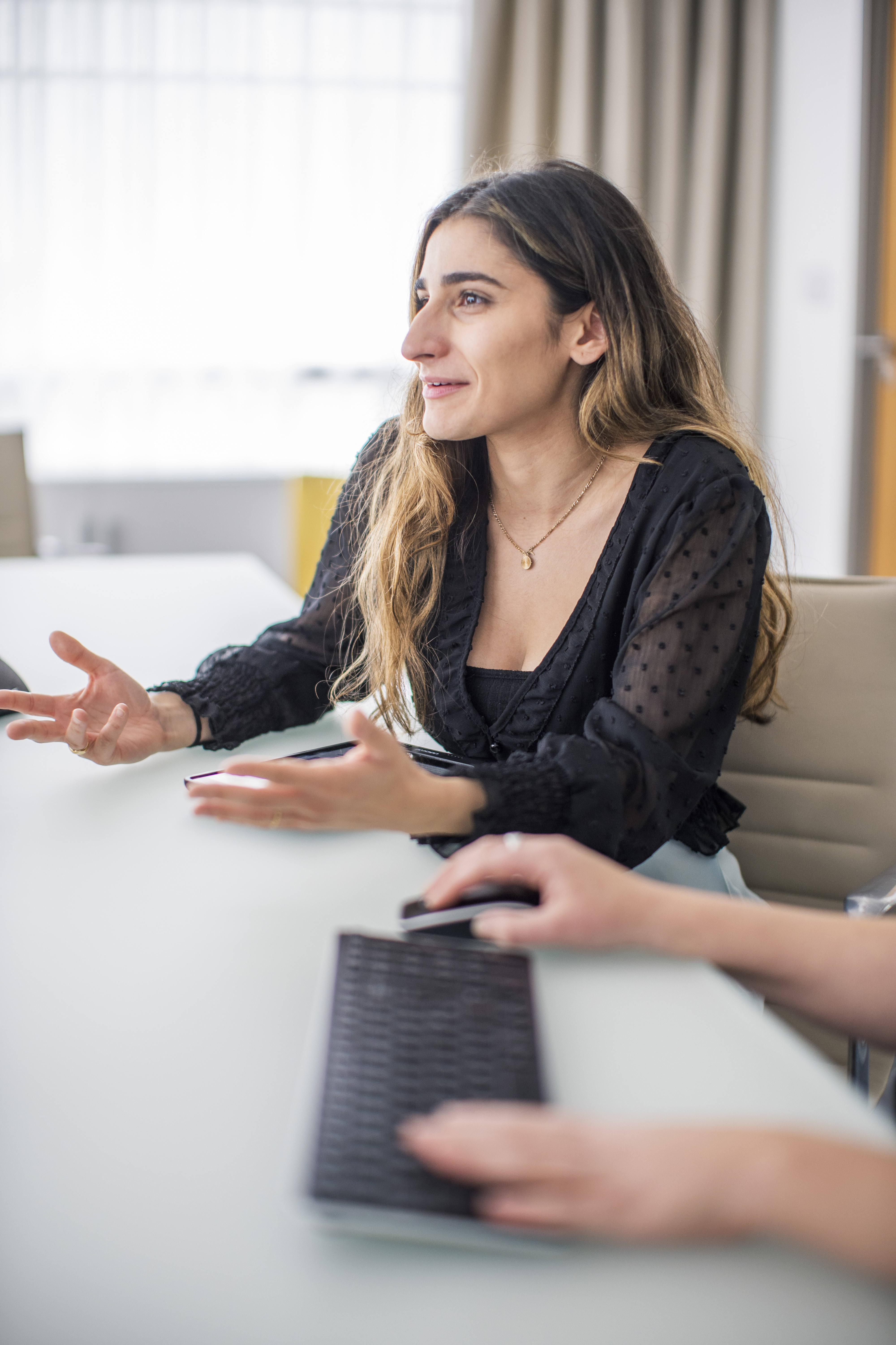 Headley Media colleague talking in a meeting