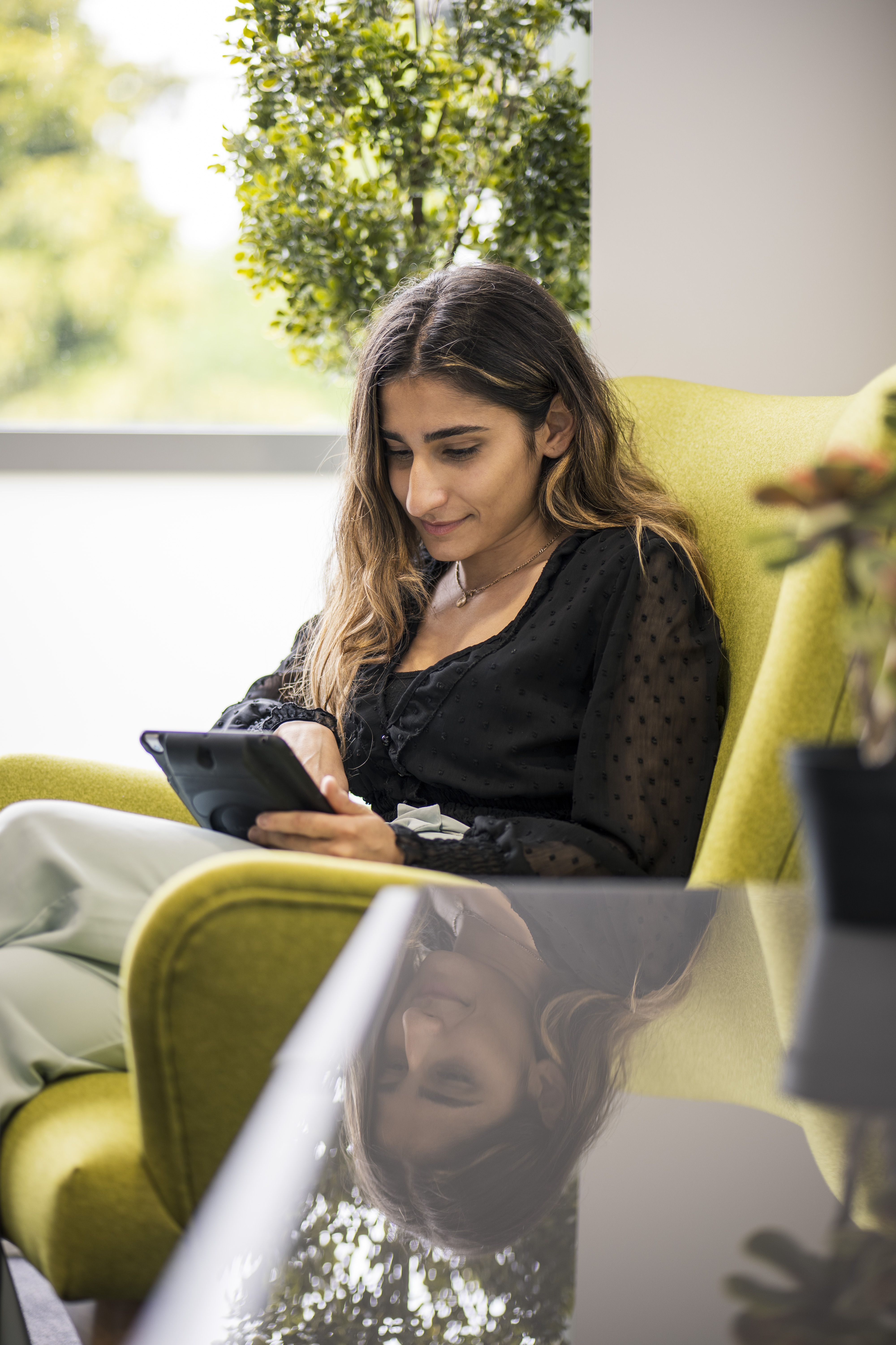 Photo of Headley Media colleague on tablet