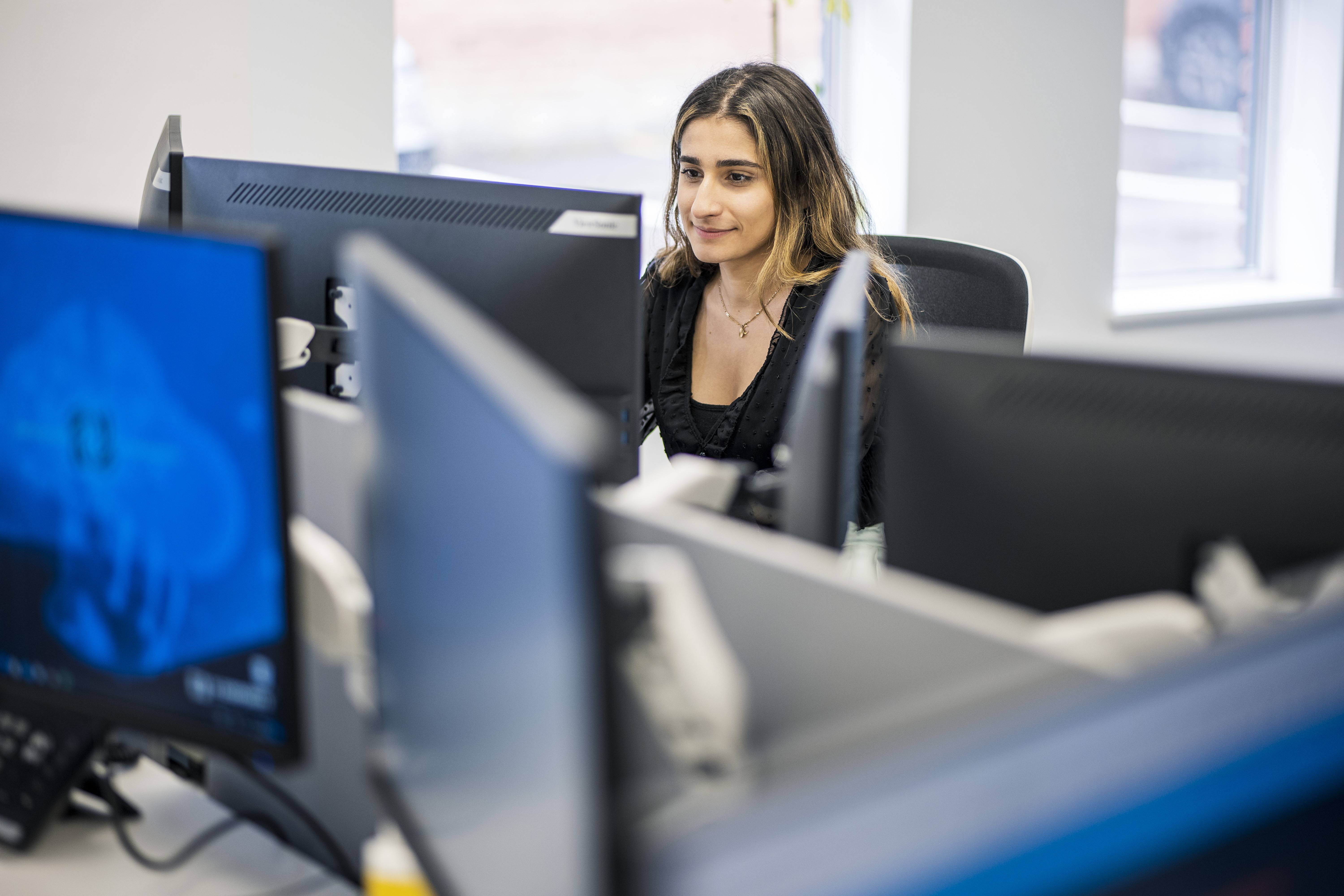 Headley Media colleague working at desk